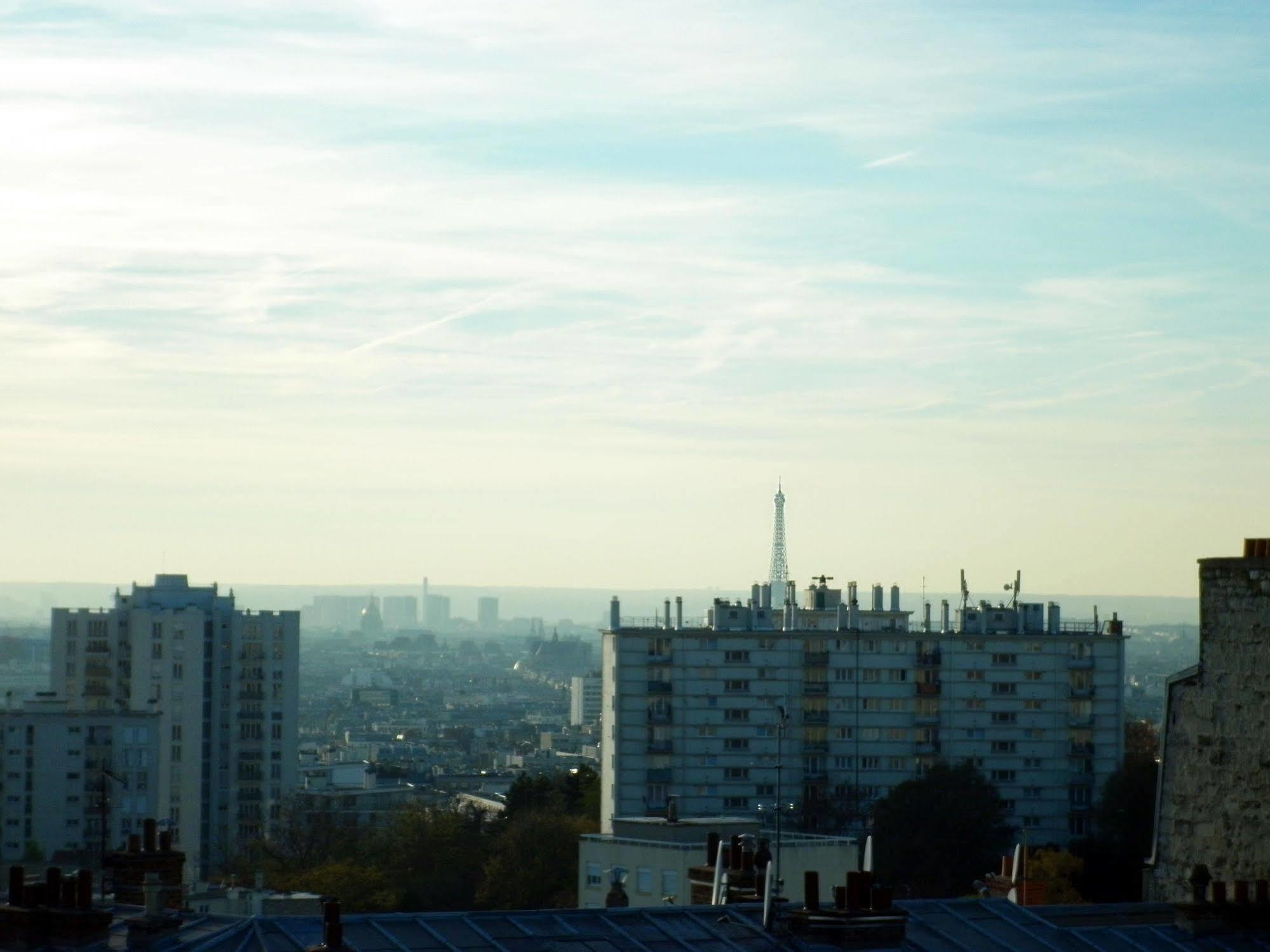 Hotel Ermitage Paris Exterior photo View of Paris from the top of the castle